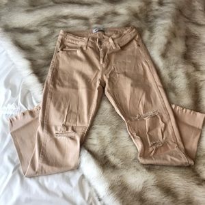 Peach/nude frayed skinny jeans